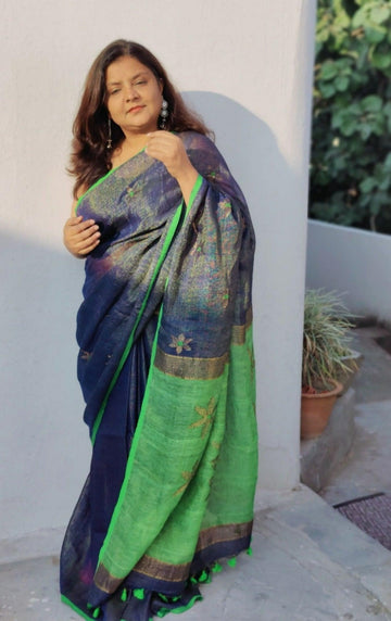Blue tissue linen saree with tassels in Pallu