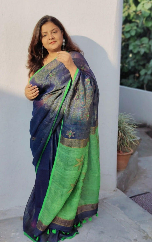 Blue tissue linen saree with tassels in Pallu